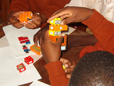 Students building with I-Blocks