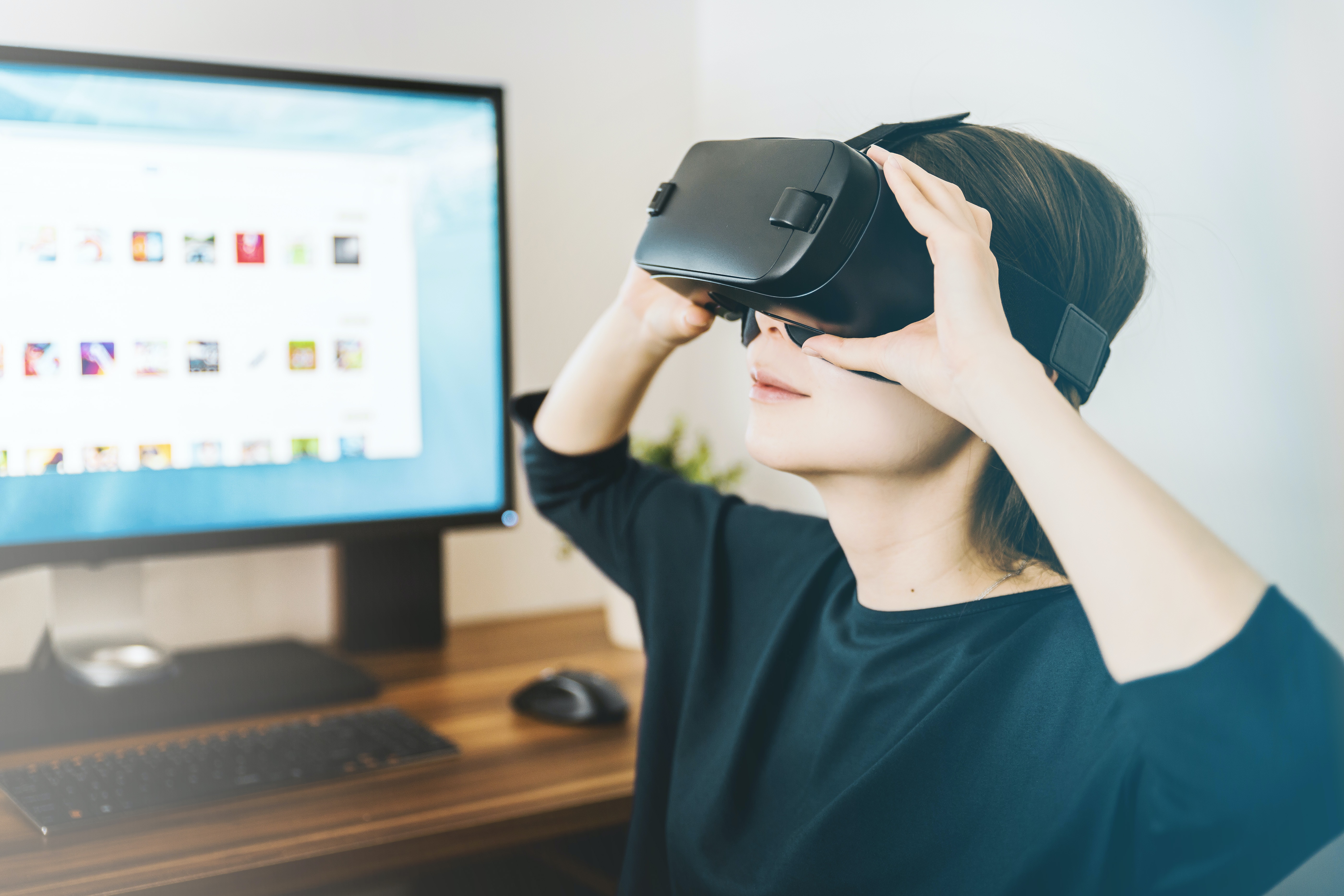 A young person with VR glasses