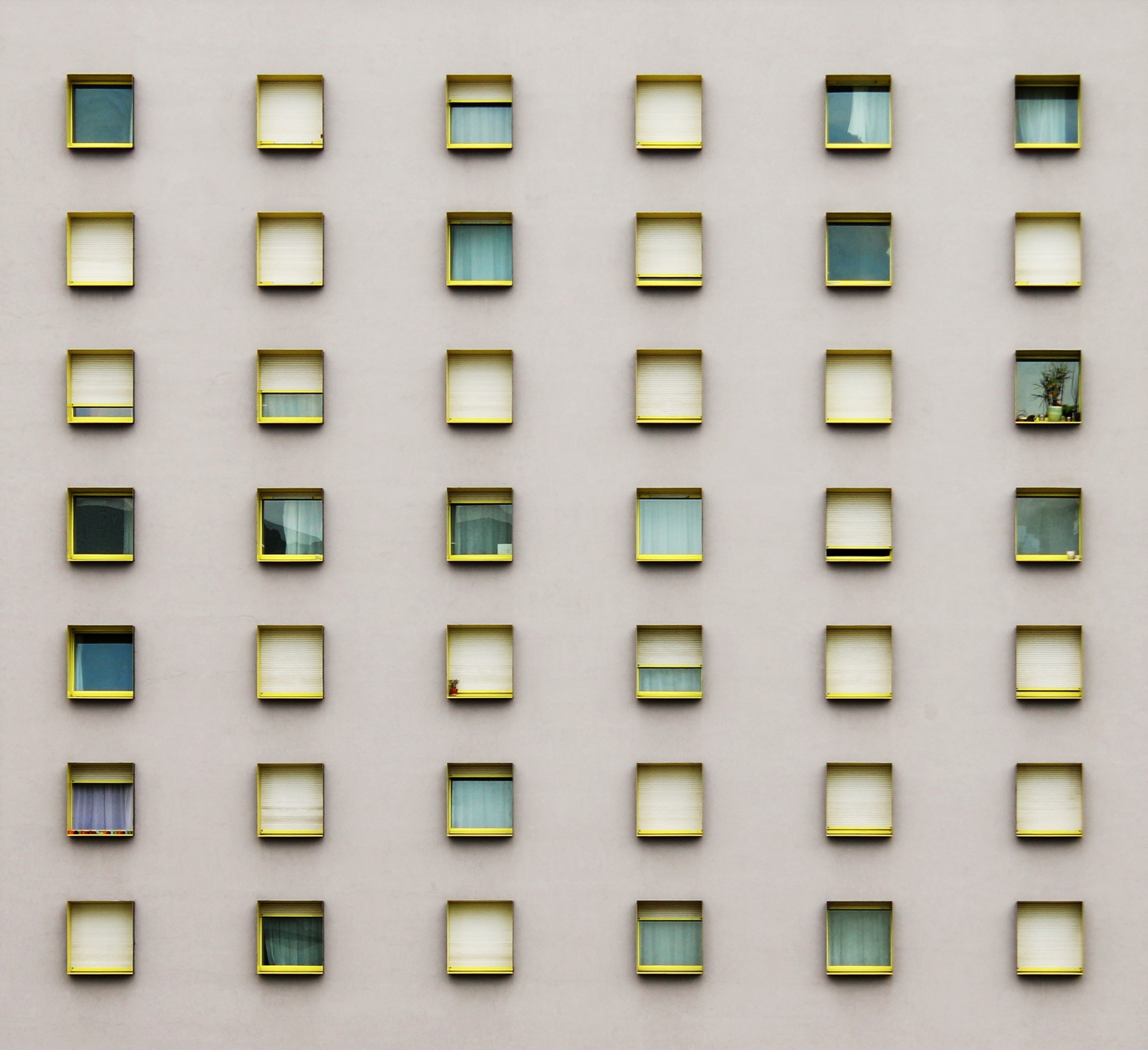 Rows of windows on building facade. Image from Pexels Pixabay. 
