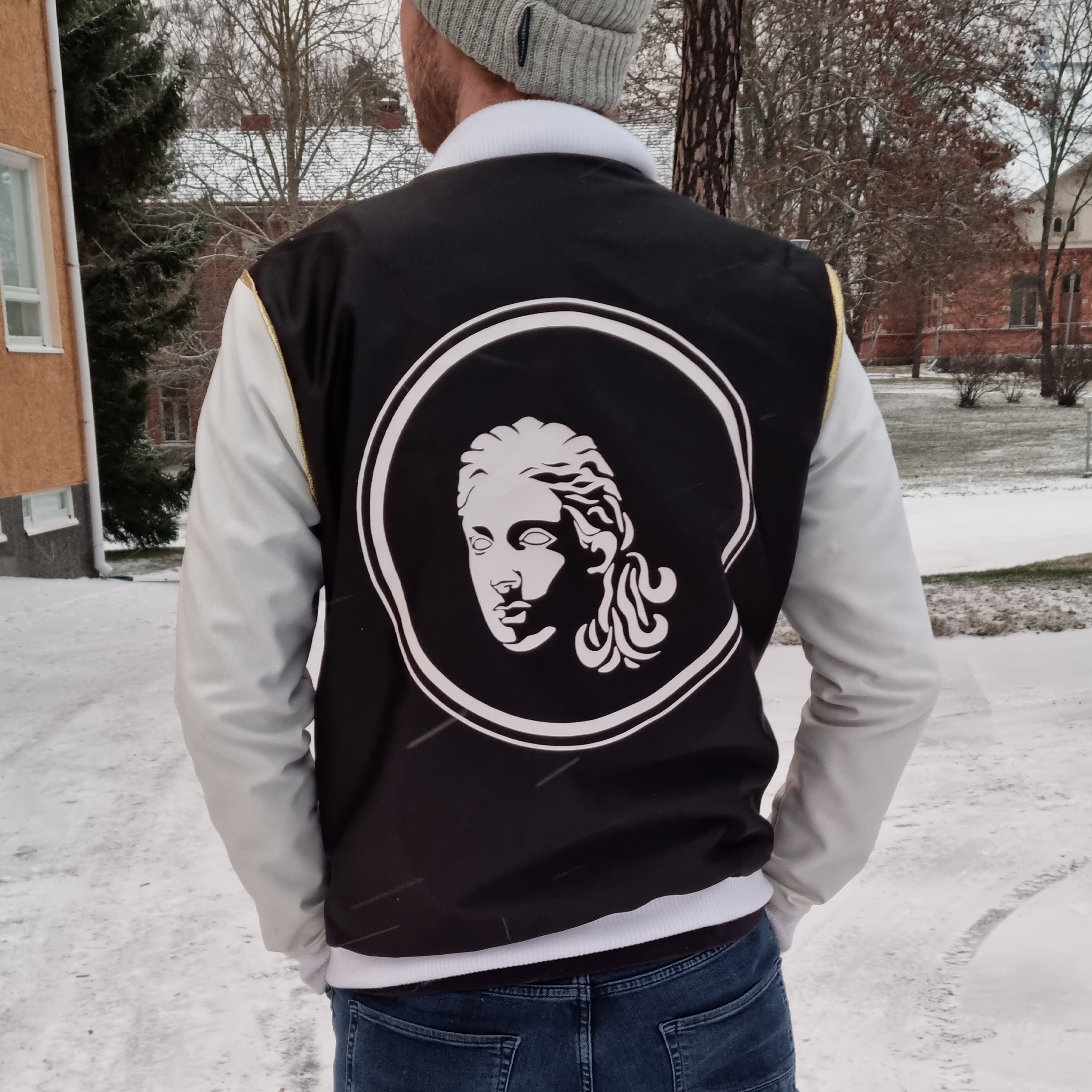 A vinyl-cut decoration on the back of a bomber jacket